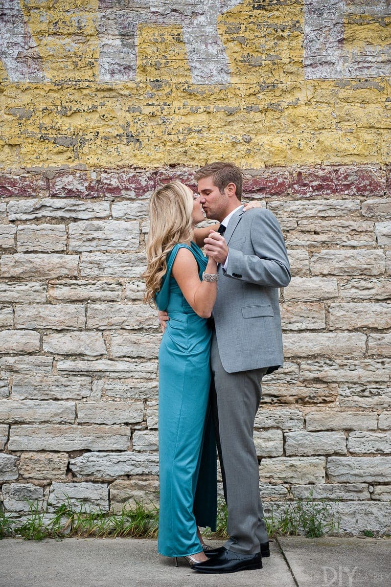Dancing and kissing with glam engagement photos