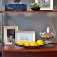 Go for the unexpected and colorful when you style your shelves.