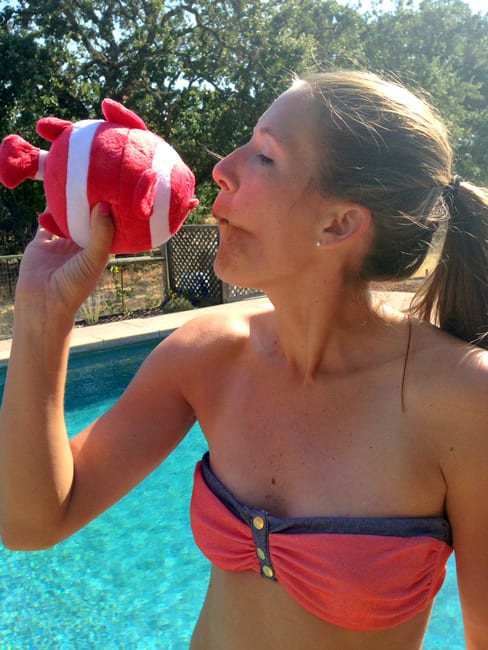 With a stuffed fish
