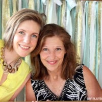 Two guests take a picture at Casey's bridal shower.