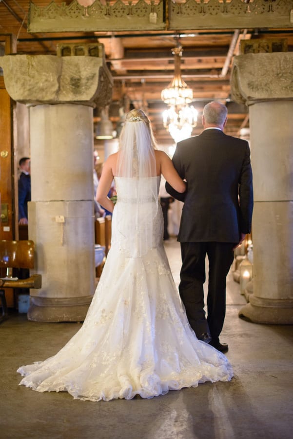 A father walking her daughter down the aisle is a special wedding moment.