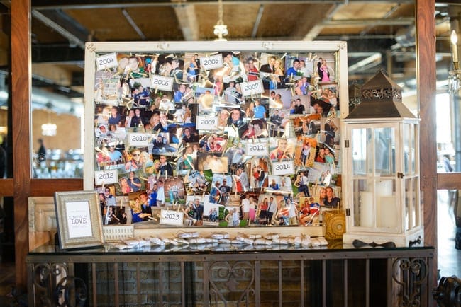 This photo wall adds a personalized touch to the wedding decor.