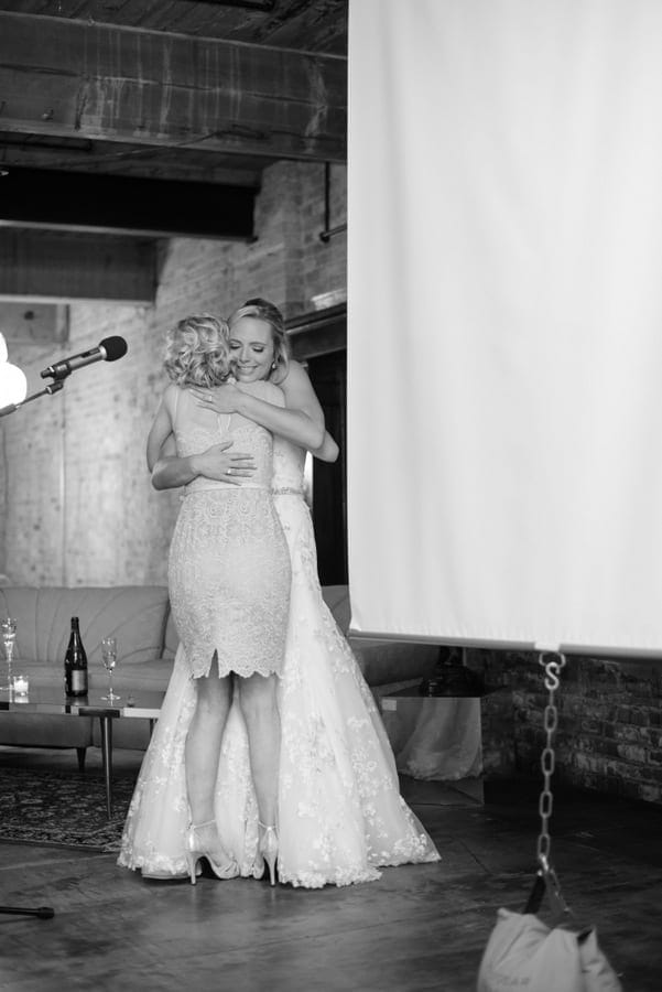 Best friends embracing each other at a wedding is a must.