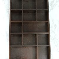 Goodwill shelf I found - I think this uset to hold figurines.