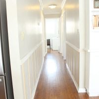 This board and batten hallway is a nice addition to the home.
