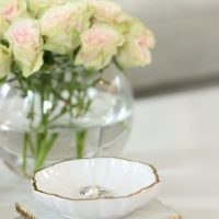 White roses in a bowl vase