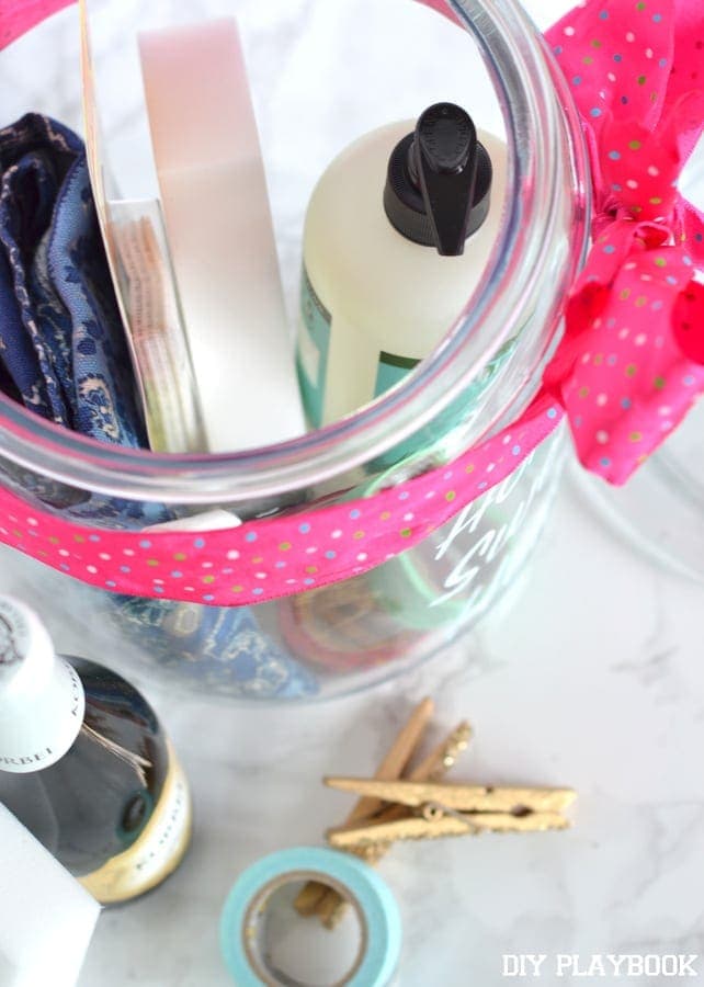 We added a bright pink ribbon to our housewarming jar!