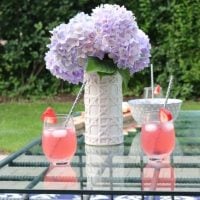 Fresh flowers brighten up this backyard table setting.