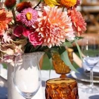 Gorgeous flowers and table settings at the summit attendees dinner