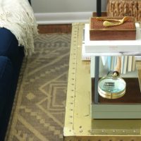 Gold steamer trunk with accessories.