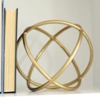 Golden sphere sculpture.