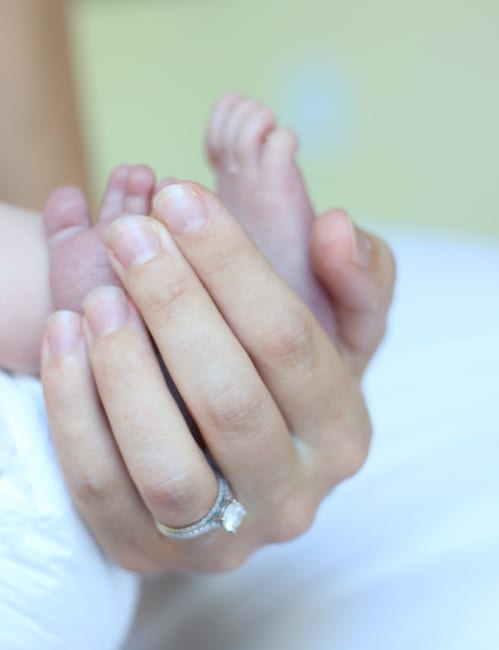 Taking images of babies feet and hands is always a cute photo idea.