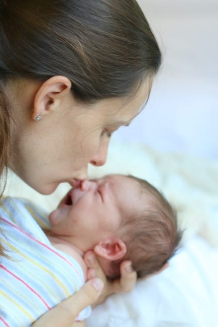 Mom and baby make a precious photo.