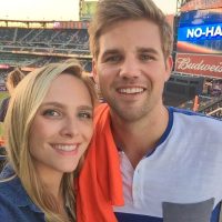 casey and finn enjoy a Mets baseball game