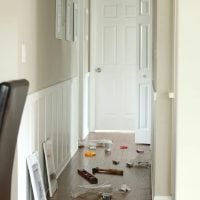 Using your tools hang the frames onto the wall.