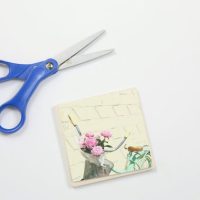 Cut out the photo you want to use to fit the size of the coaster.