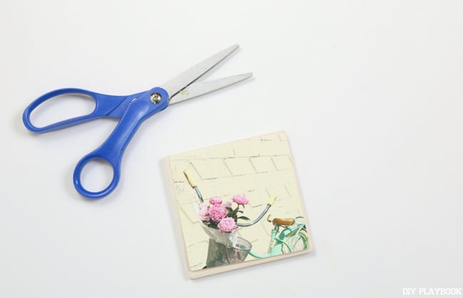 Cut out the photo you want to use to fit the size of the coaster.