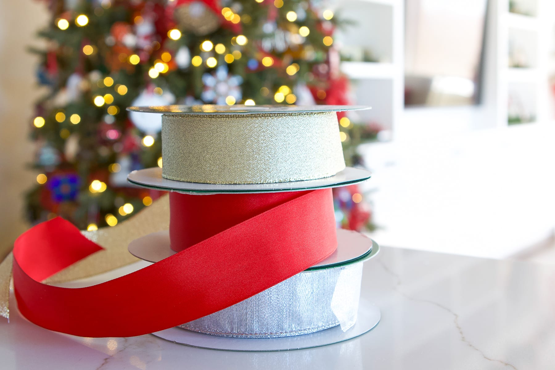 Buy spools of 2-inch ribbon from Costco to save money