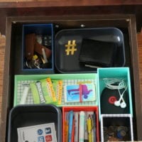 This organized junk drawer has a place for every item.