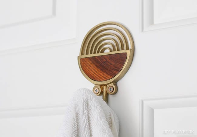 Love this brass and wood towel hook. I put it on the back of the door in the guest room.