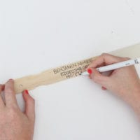 write names on paint stir sticks