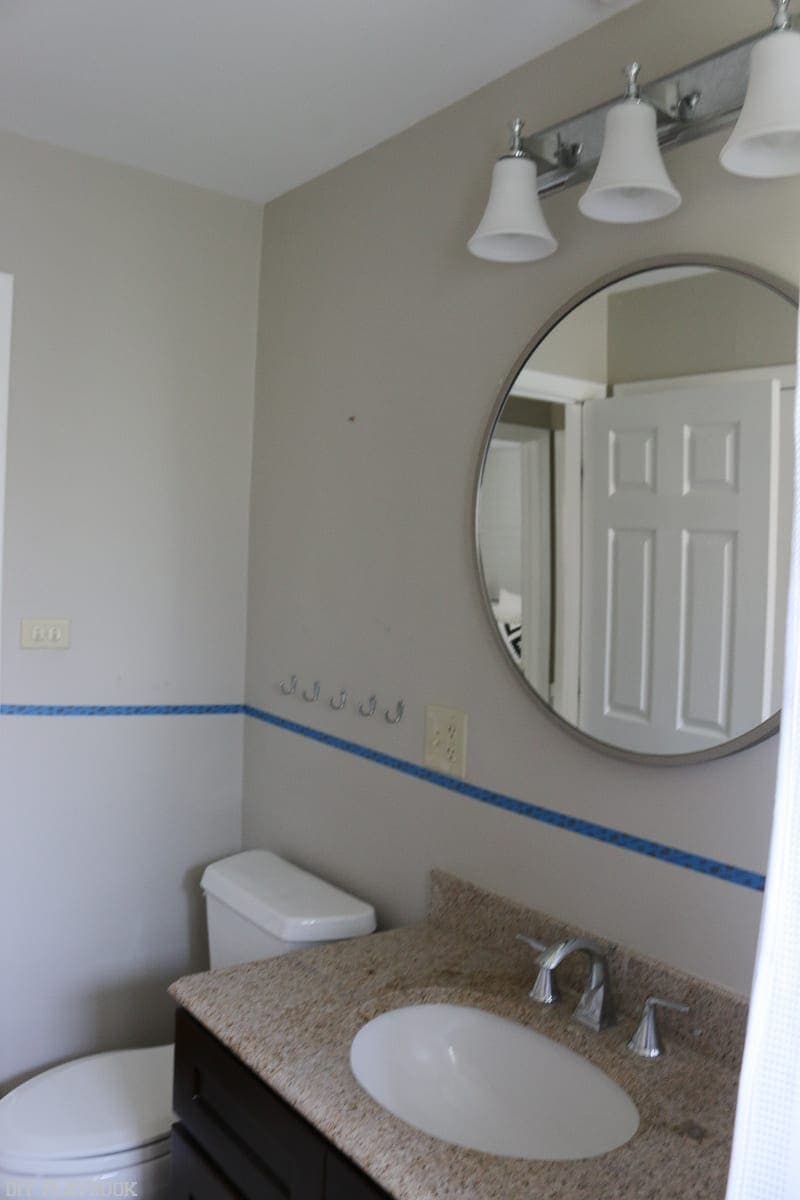 Bathroom before shiplap and paint makeover.