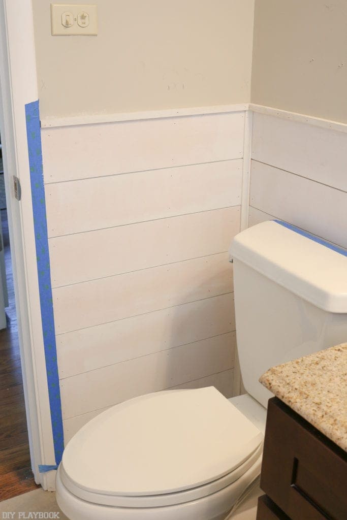 Examine the wall after all the shiplap is hung to see how it looks.