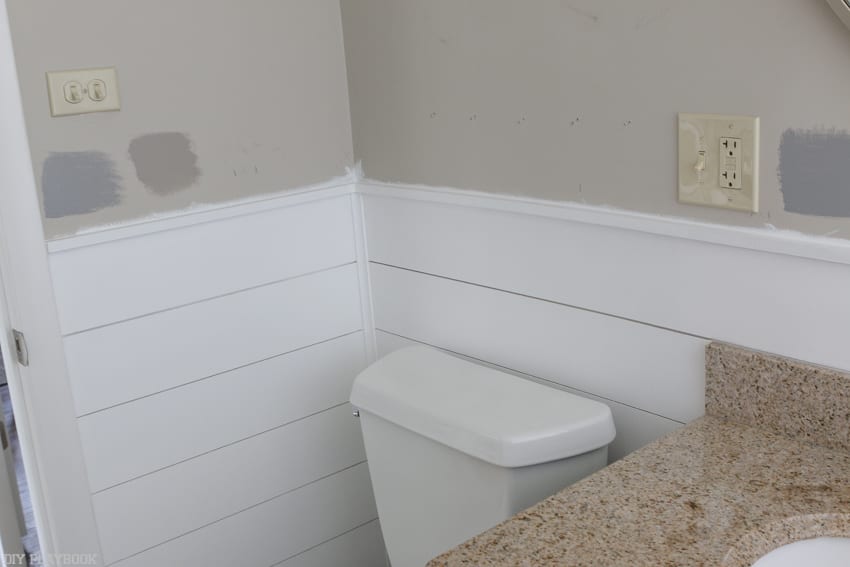The white shiplap wall makes everything else look brighter and cleaner.