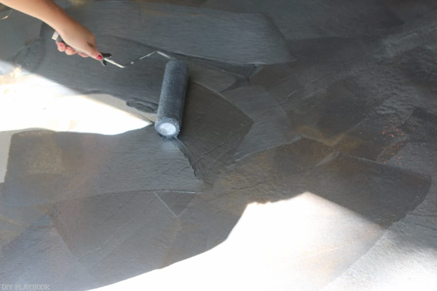 Apply paint: Sealing Garage Floor DIY Project with Epoxy | DIY Playbook