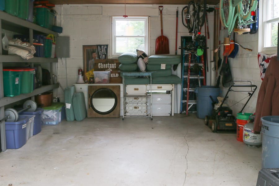 Here is the current look of our garage - not terrible, but I'd like it to be a lot more organized and have more workspace. 