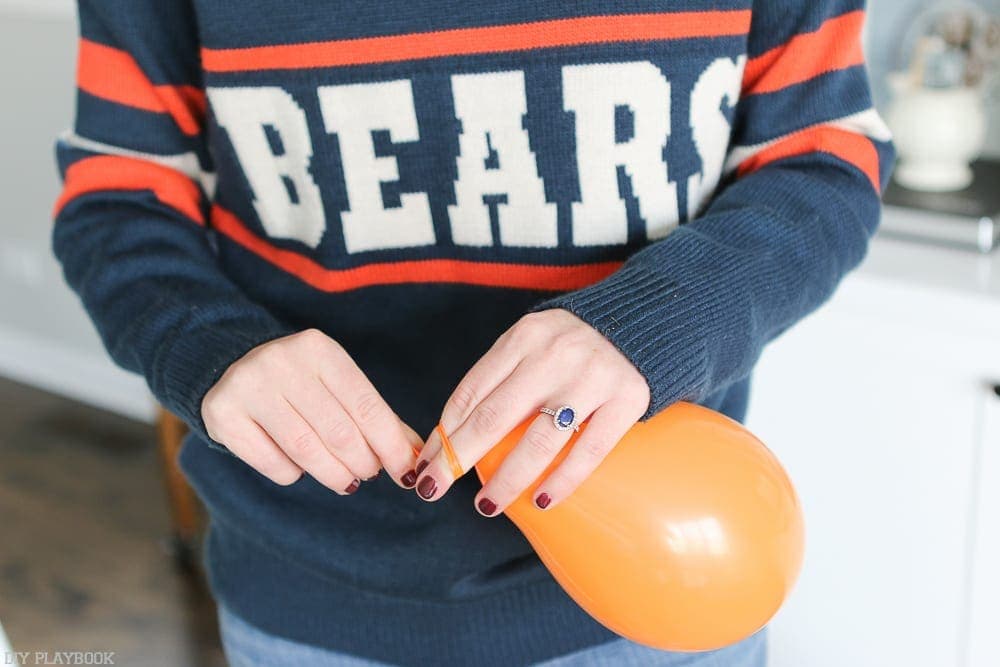 Tie each balloon for the garland