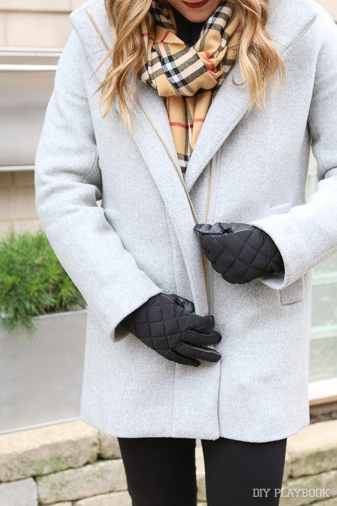 This classic wool coat pairs well with a patched winter scarf.