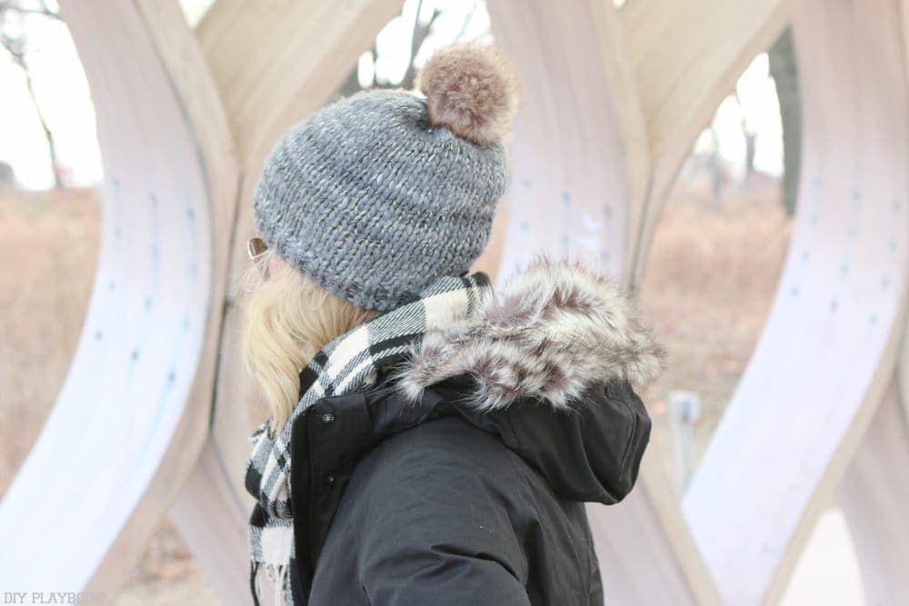This adorable winter hat with a fur pom pom is cute and so warm. 
