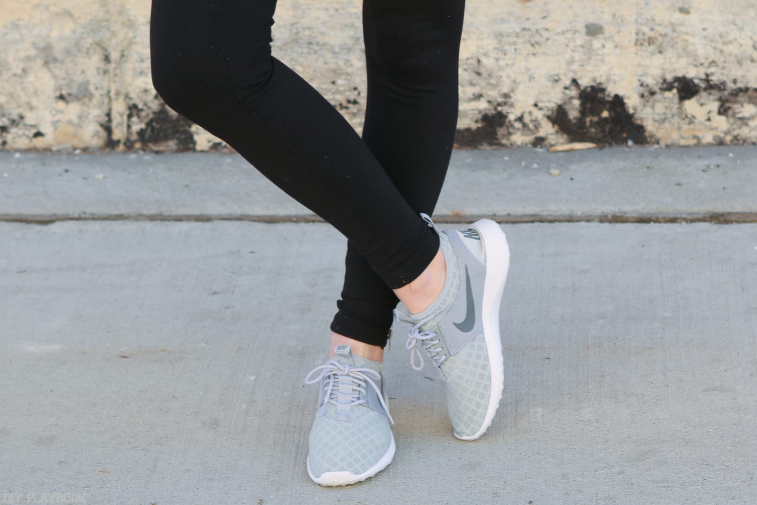 Time for a jog! These grey Nike sneakers work for working out or runnin errands. 