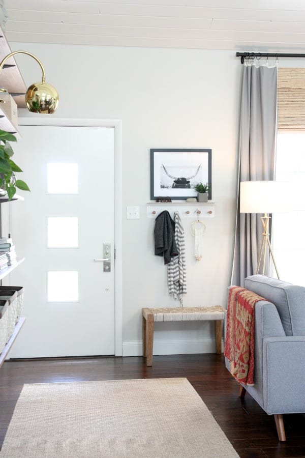 A bench near the front door adds decor to the entryway.