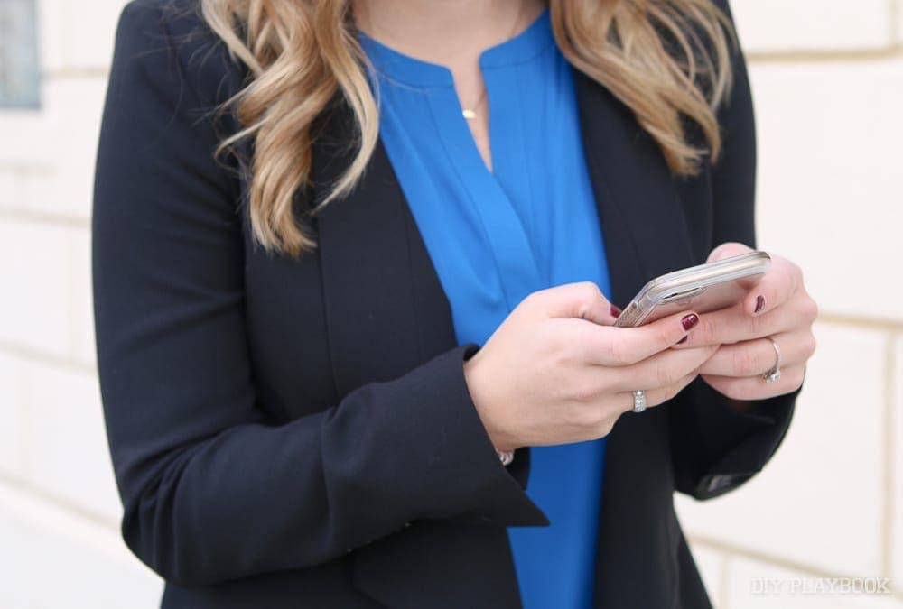 Typing on an iphone screen. 