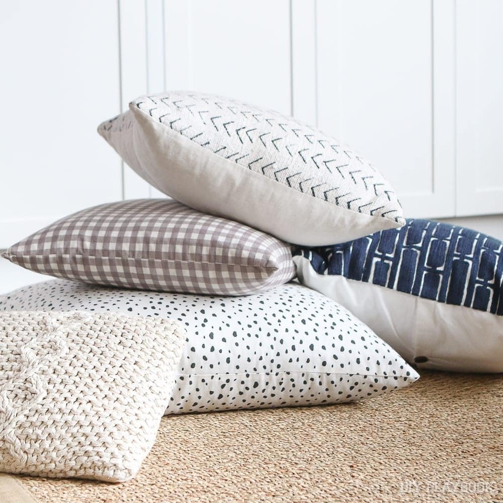 A variety of colors and textures on these throw pillows