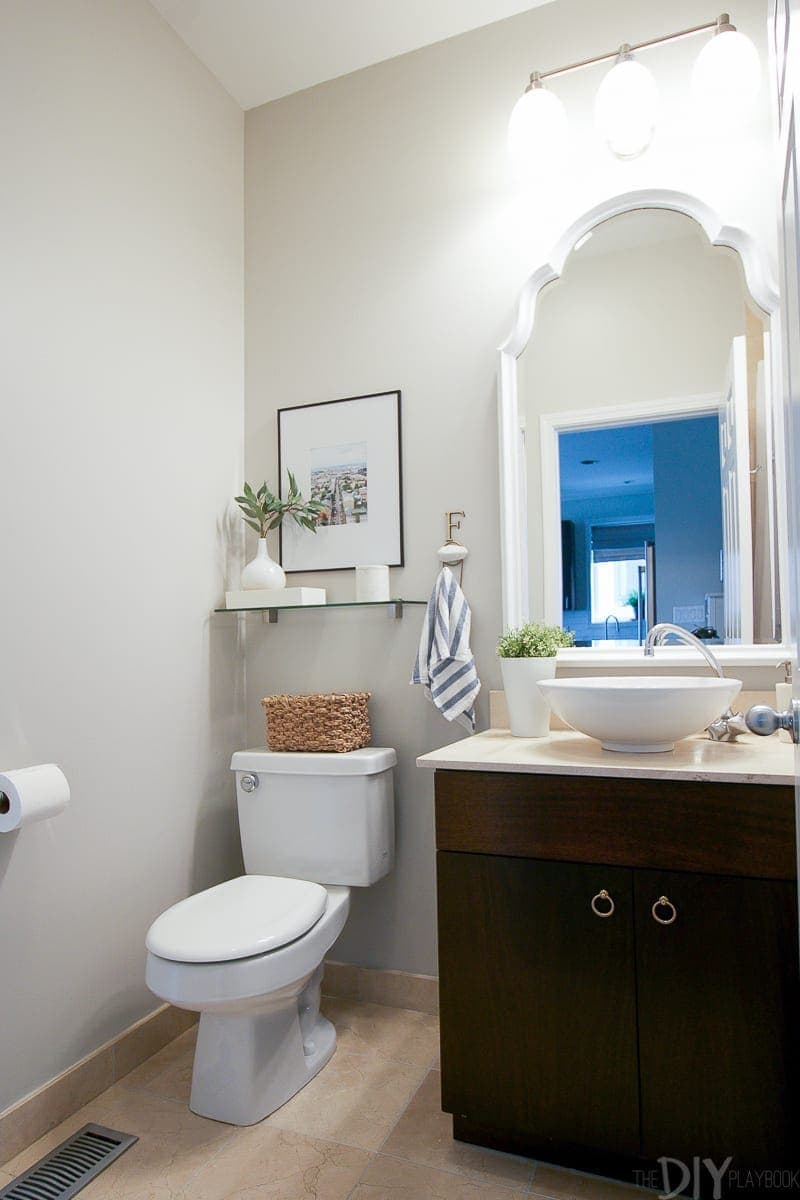 The guest bathroom didn't get a huge makeover, but I did put in a new vanity mirror and new lighting. 