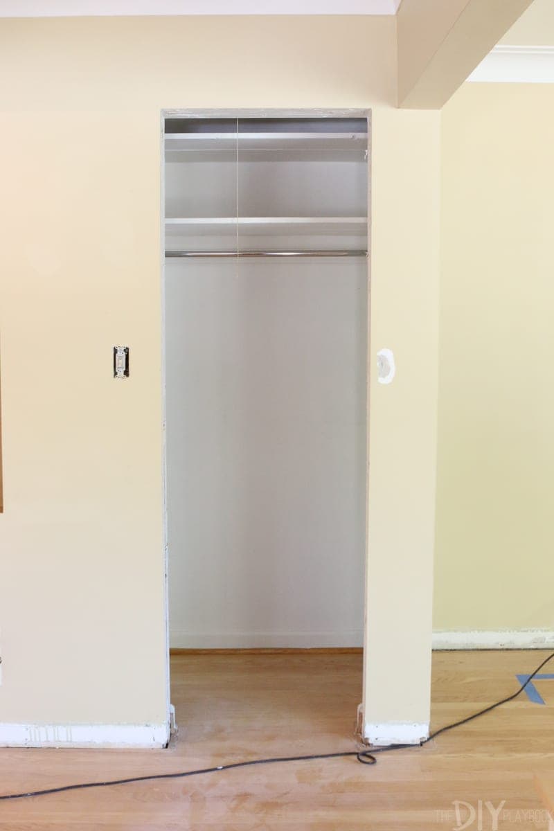 Hallway closet before demo.