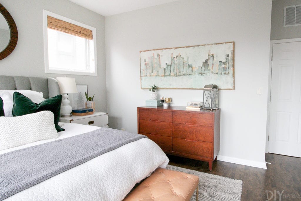 Dresser and art in bedroom