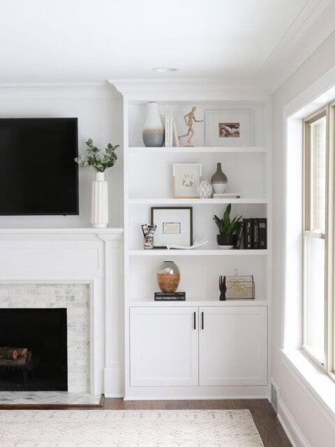 White built-ins around fireplace