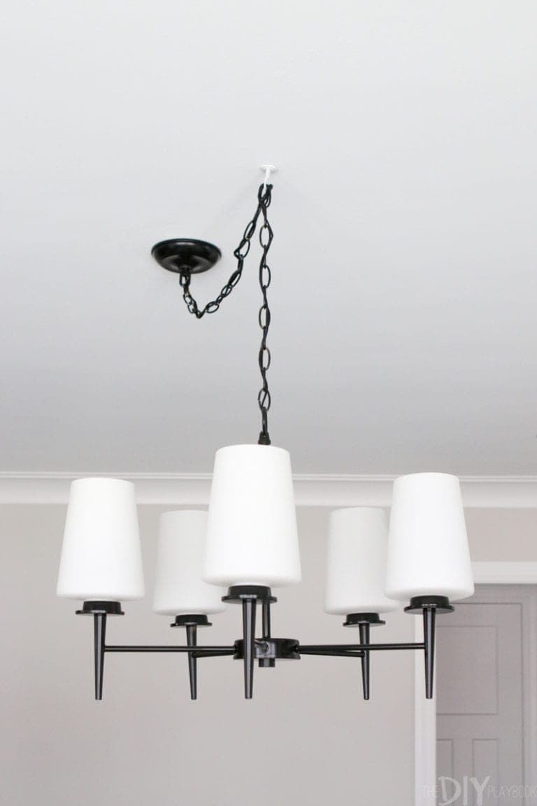 Adding a swag light to a dining room space