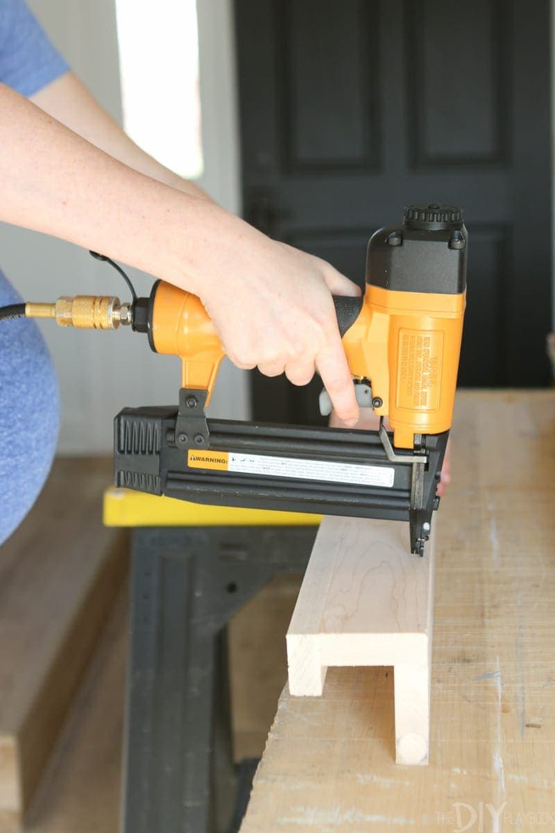 Nailing the wood to DIY book ledges