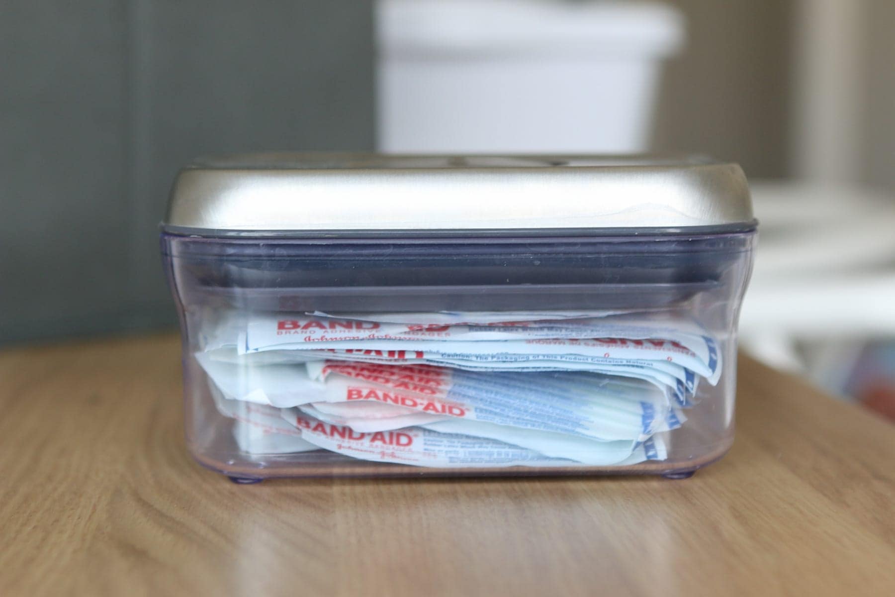 Organizing a linen closet with containers