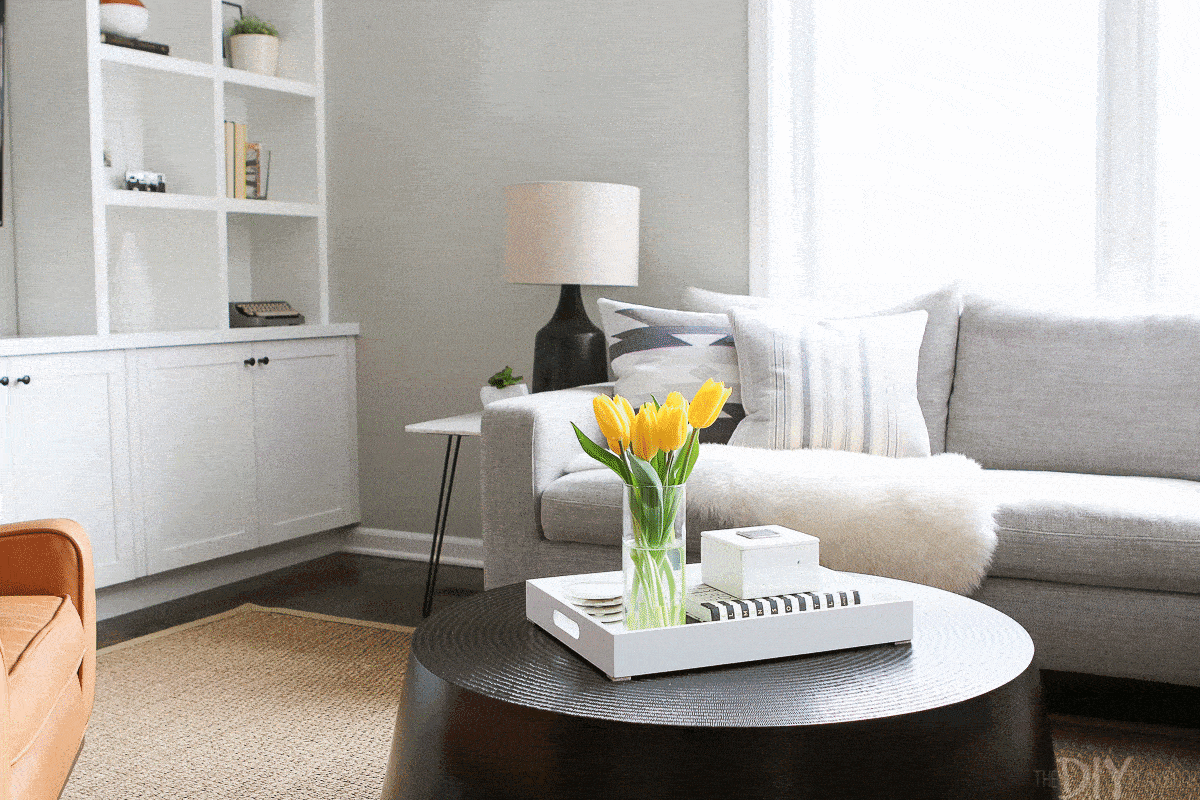Step-by-step, how to style a round coffee table.