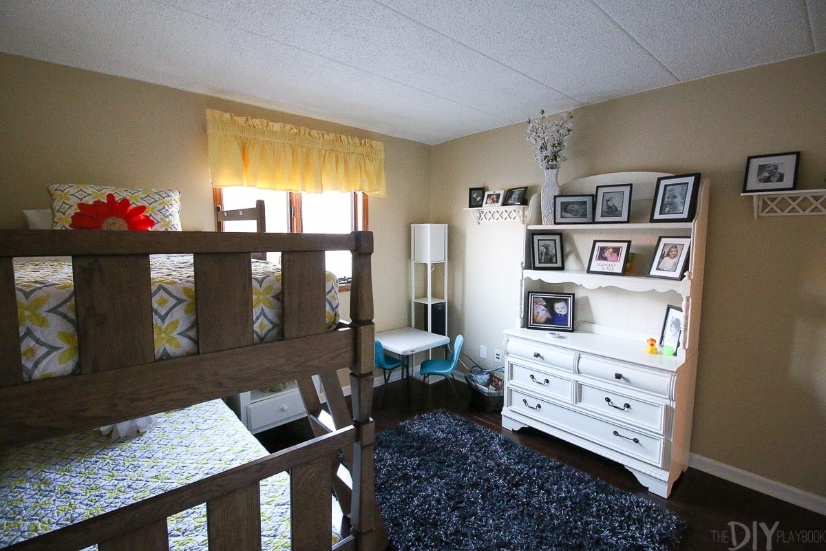 Dark and beige kids' room space. 