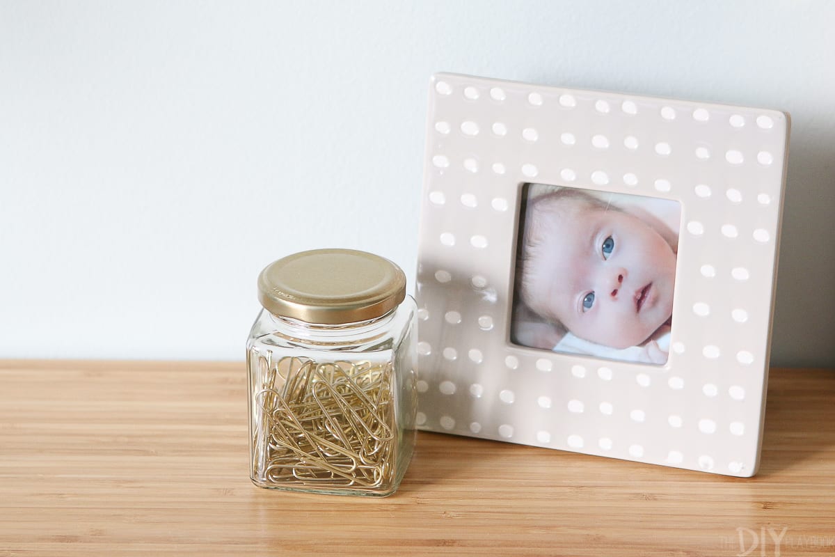 Gray and white picture frame on a desk