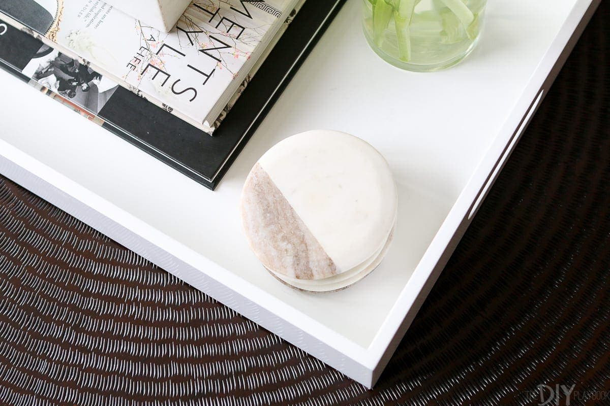 We use marble coasters to keep our coffee table free of water damage.