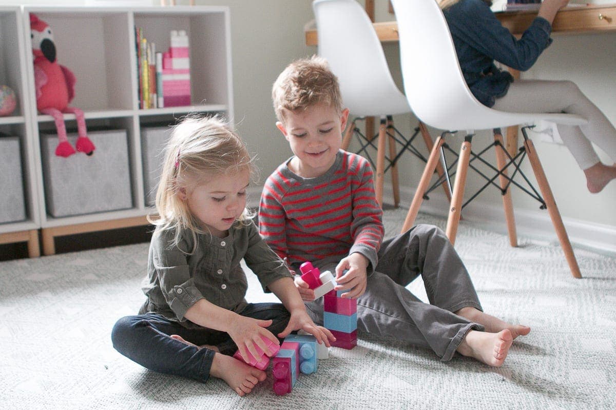 A cozy carpet or rug allows for play time on the ground 