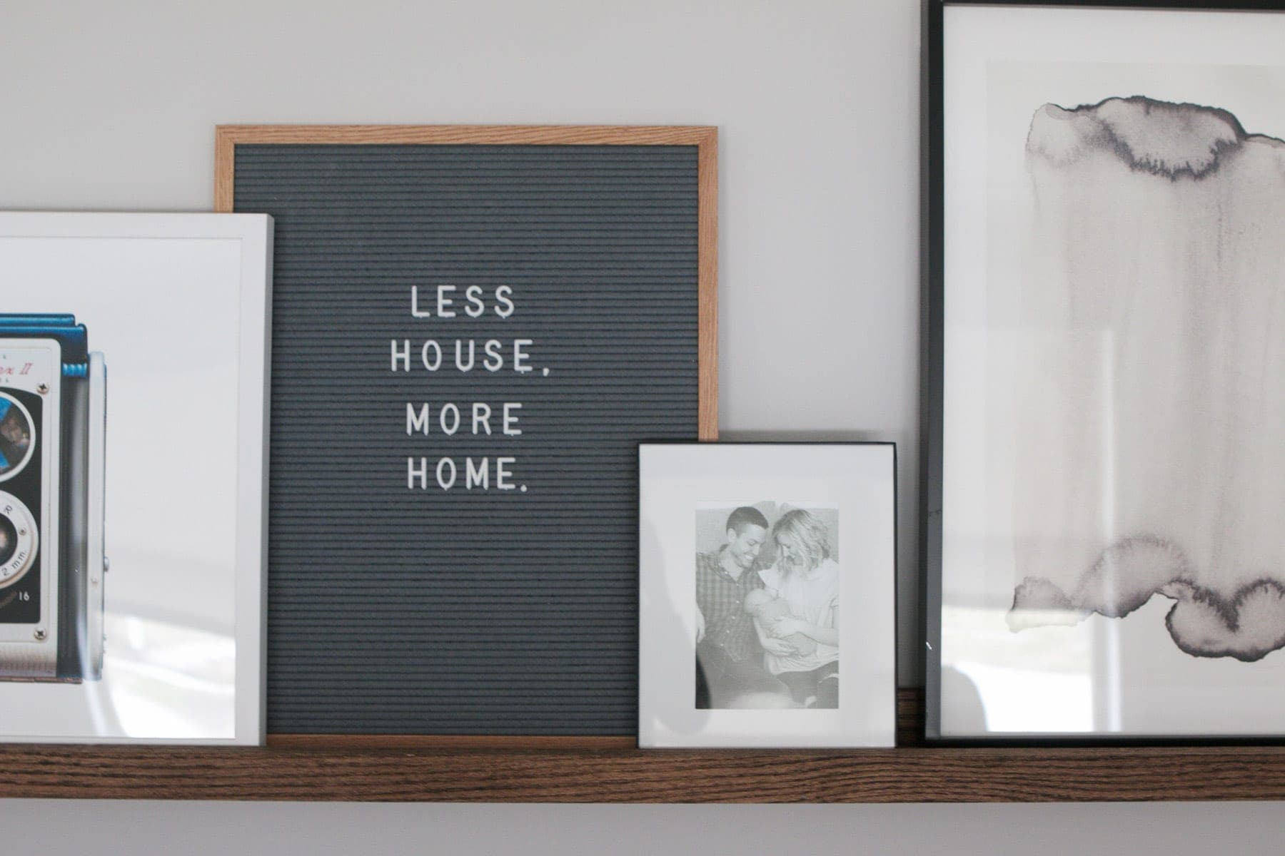 Add a letterfolk board to your picture ledge so you can write fun quotes on there.